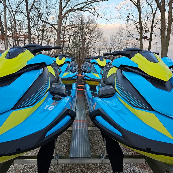 a blue motorcycle parked in a parking lot