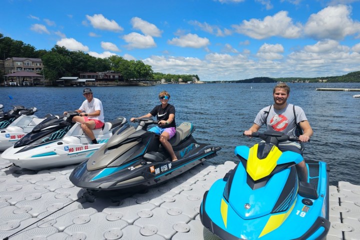 a group of people on a boat in the water