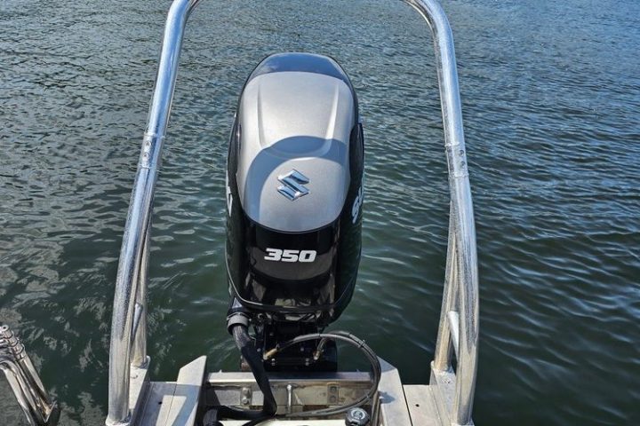a boat that is sitting on a dock next to a body of water