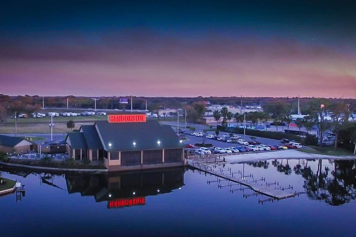 Harborside-Restaurant a boat is docked next to a body of water